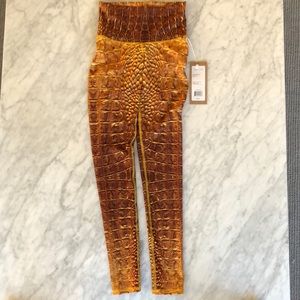 Niyama Sol gold snakeskin leggings NWT